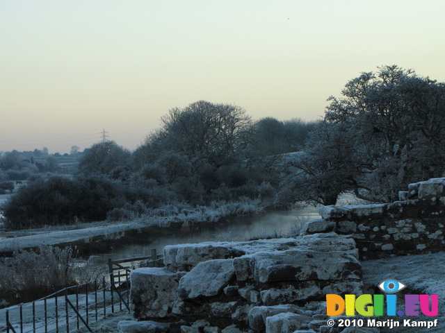 SX17080 Ogmore castle and river covered in frost